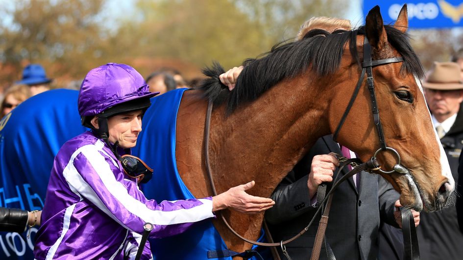 Moore was posing for the photographers again after Minding's win