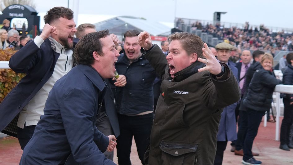 Trainer Dan Skelton celebrates winning the Greatwood Hurdle with West Cork