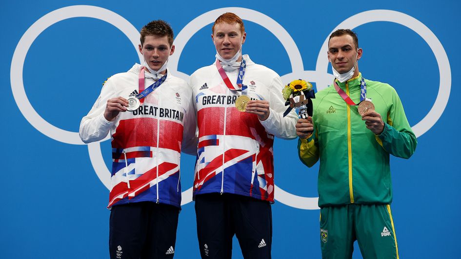 Tom Dean and Duncan Scott receive their medals
