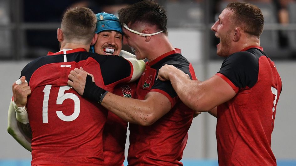 England's wing Jack Nowell (second left) celebrates his try