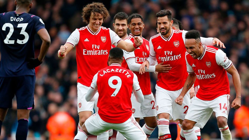 Alexandre Lacazette celebrate his goal against West Ham with his Arsenal teammates