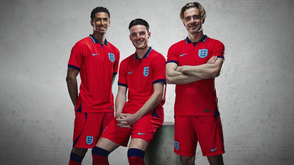 Jude Bellingham, Declan Rice and Jack Grealish wearing the new England away kit