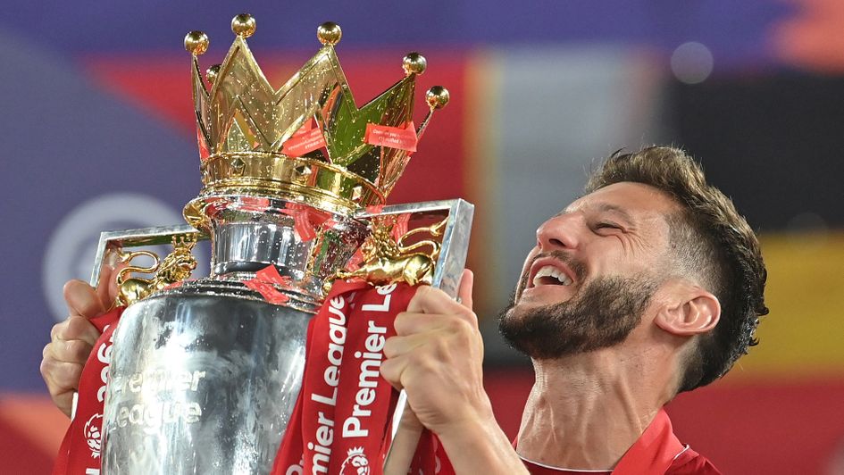 Adam Lallana with the Premier League trophy