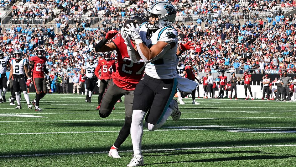 Tommy Tremble catches a touchdown pass