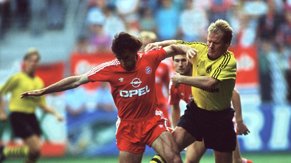 Dortmund's Murdo MacLeod (left) grapples with Bayern Munich's Radmilo Mihajlovic