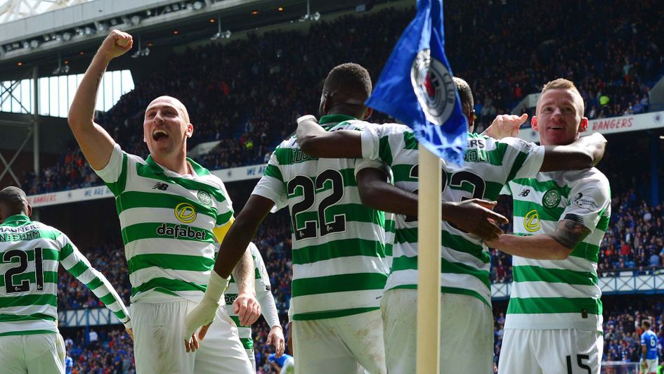 Scott Brown and Celtic celebrate winning the Old Firm derby against Rangers at Ibrox