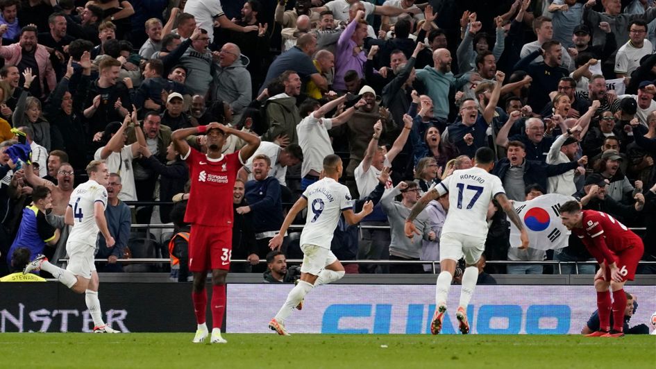 Tottenham celebrate their late winner over Liverpool