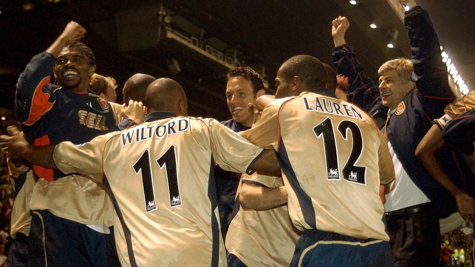 Arsenal celebrate winning the 2002 Premier League title after beating Manchester United at Old Trafford