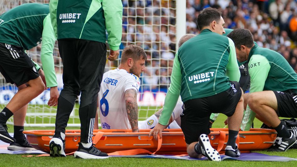 Liam Cooper is stretchered off in Leeds' home draw with Cardiff