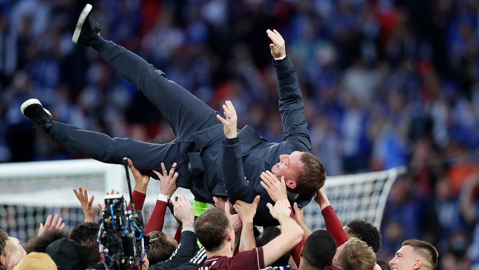 Leicester players throw Brendan Rodgers in the air after winning the FA Cup