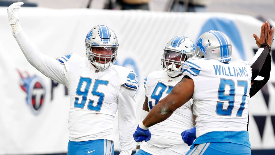 Detroit Lions celebrate a Romeo Okwara tackle