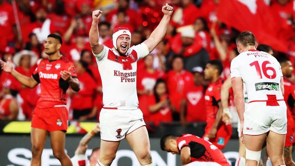 Chris Hill celebrates as England clinch their final spot