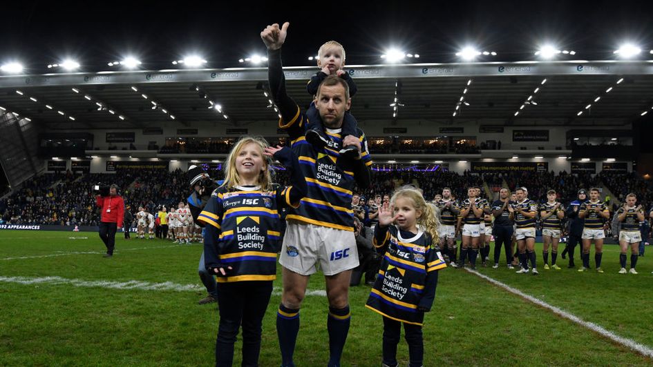Rob Burrow and his children on the pitch at Headingley