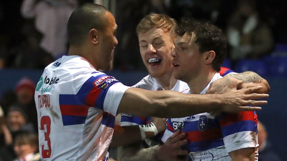 Scott Grix celebrates