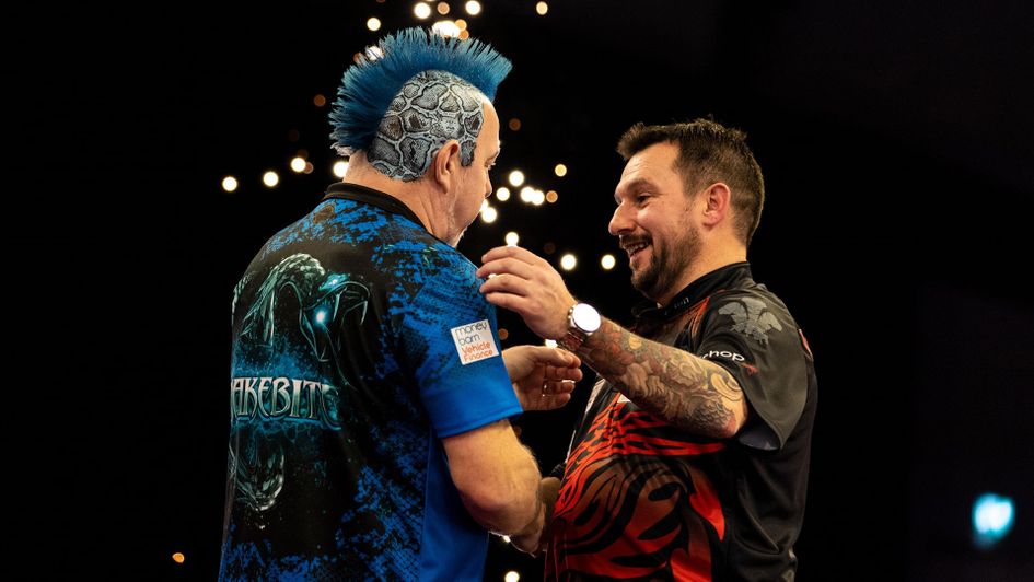 Peter Wright and Jonny Clayton (Picture: Lawrence Lustig/PDC)