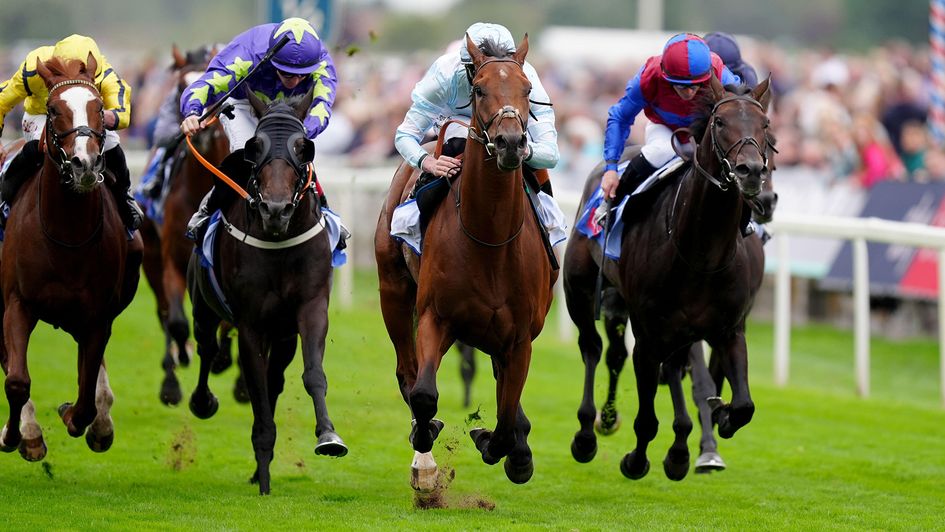 Pride Of Arras (centre), ridden by Rossa Ryan, wins the Great Voltigeur