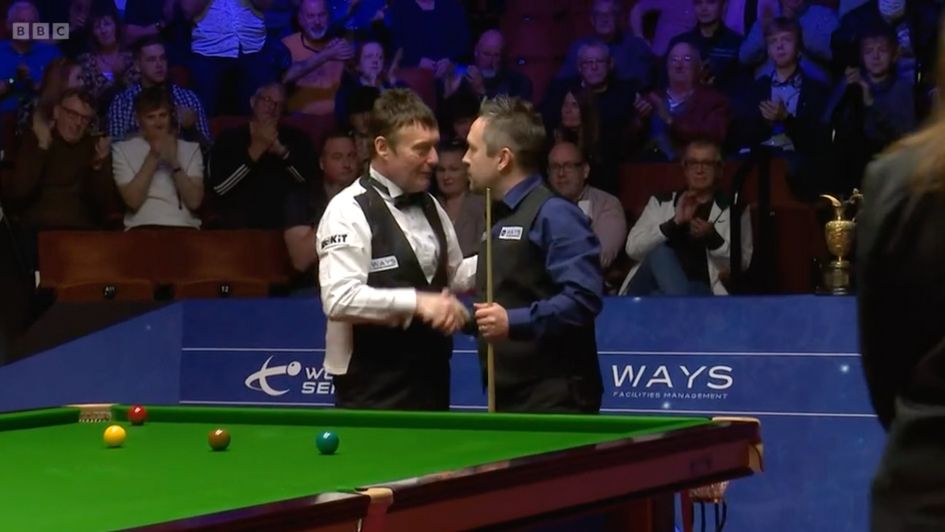 Jimmy White and Lee Walker embrace at the end of the final