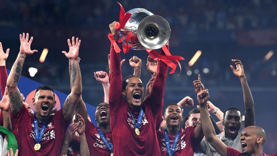 Virgil Van Dijk lifts the Champions League trophy