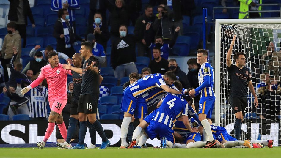 Brighton celebrate Dan Burn's goal against Manchester City