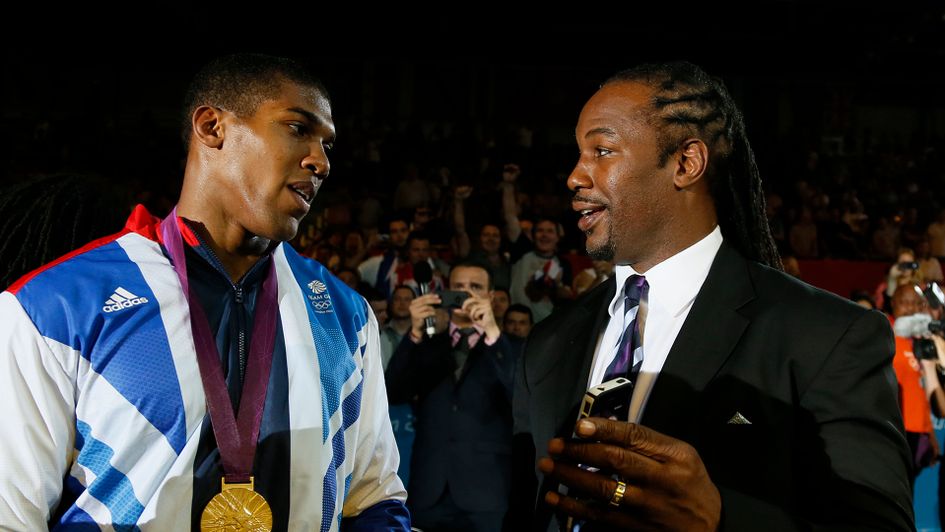 Anthony Joshua and Lennox Lewis in happier times