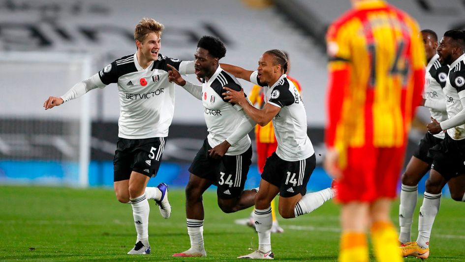 Fulham celebrate Ola Aina's goal against West Brom