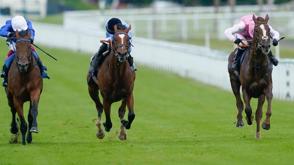 Lionel (right) comes through to win at Goodwood