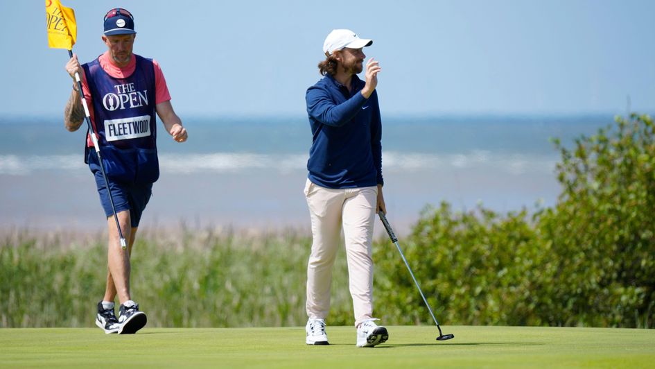 Fleetwood and his minder during a fabulous start to the Open