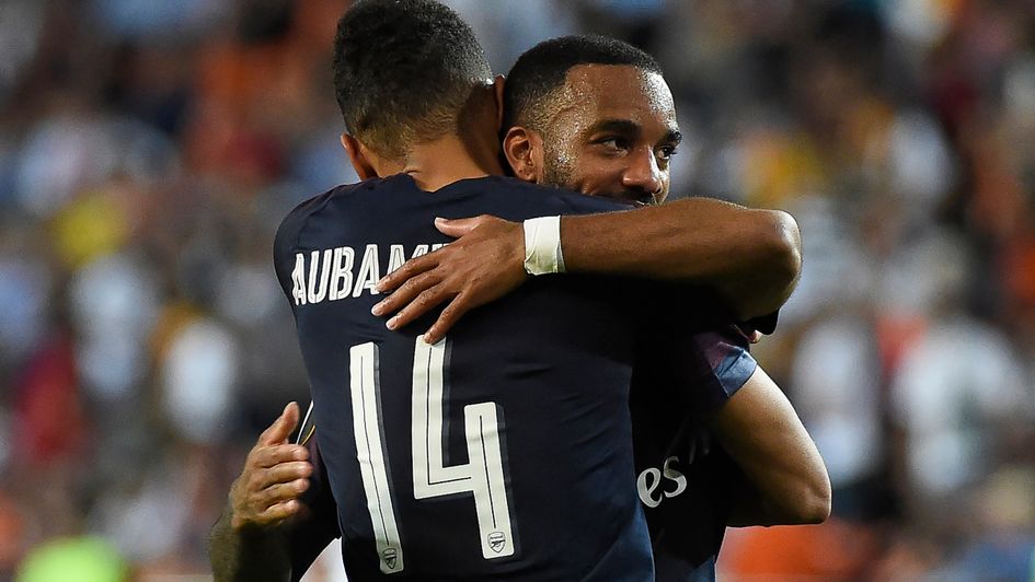 Pierre-Emerick Aubameyang and Alexandre Lacazette celebrate a goal for Arsenal in Valencia