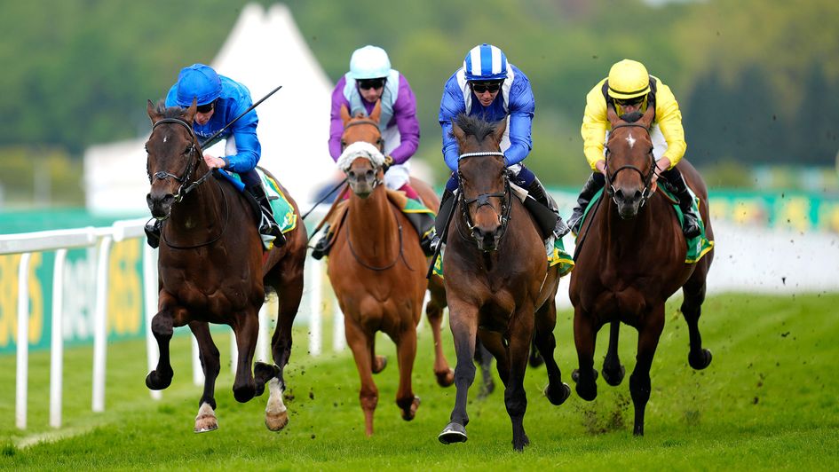 Al Aasy, ridden by Jim Crowley (centre right, blue and white striped cap)
