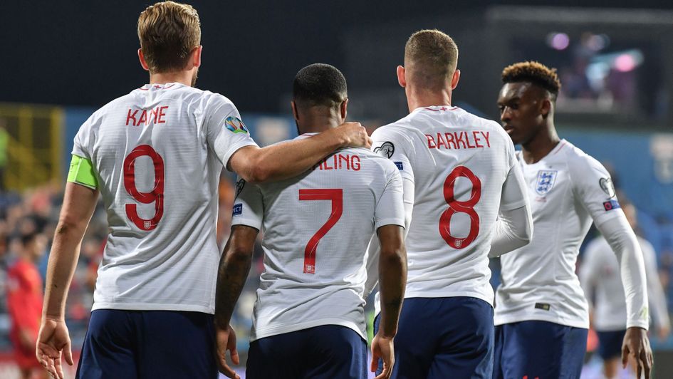 England players celebrate in Montenegro