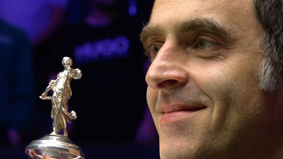 Ronnie O'Sullivan gets his hands on the Crucible trophy for a sixth time