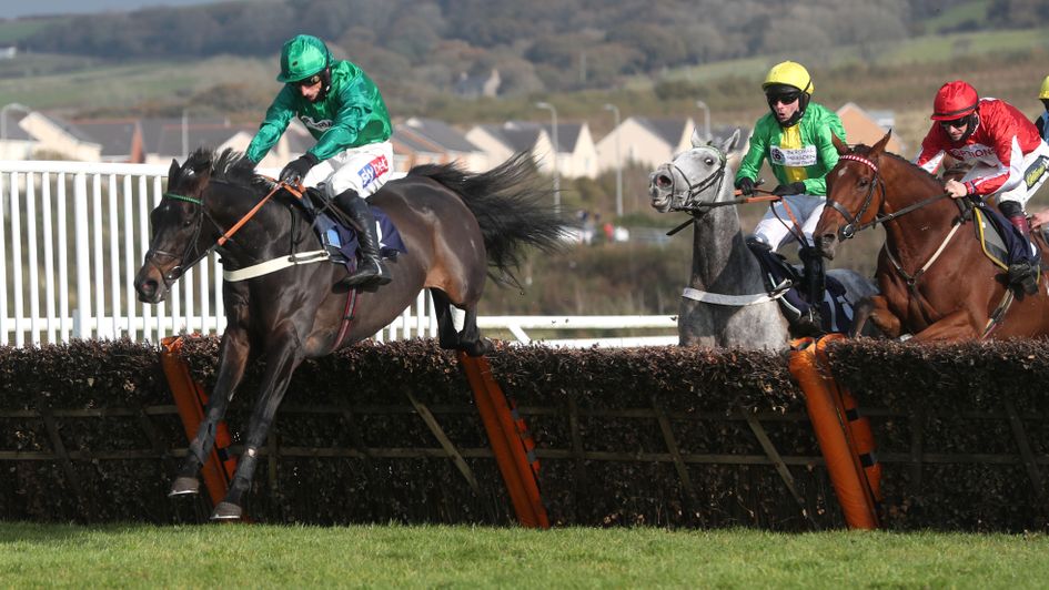 Sceau Royal leads over the last in the Welsh Champion Hurdle