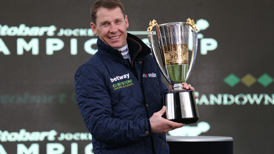 Richard Johnson with the 2017/18 Champion Jockey trophy