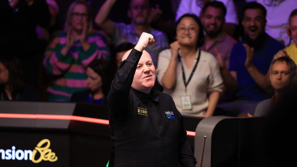 A clench of the first for John Higgins