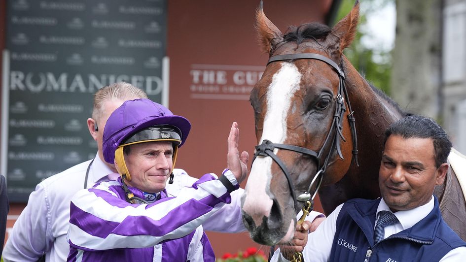 Ryan Moore gives Diego Velazquez a well-deserved pat