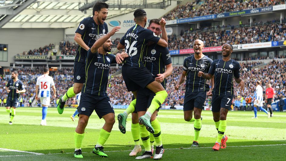 Manchester City celebrate Aymeric Laporte's goal against Brighton