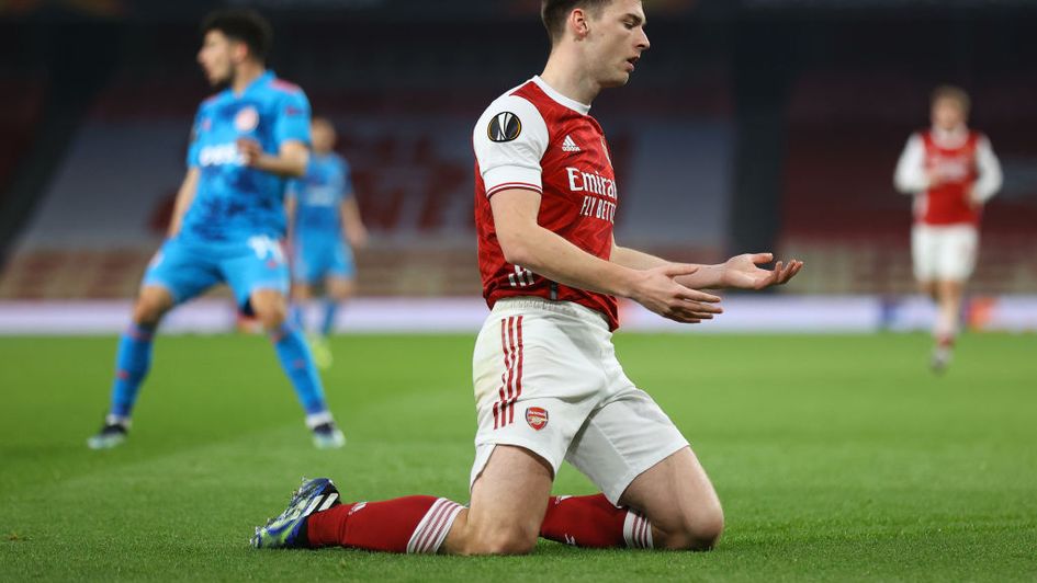 Arsenal go through despite losing