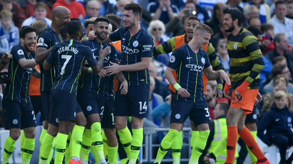 Manchester City celebrate Riyad Mahrez's goal away at Brighton
