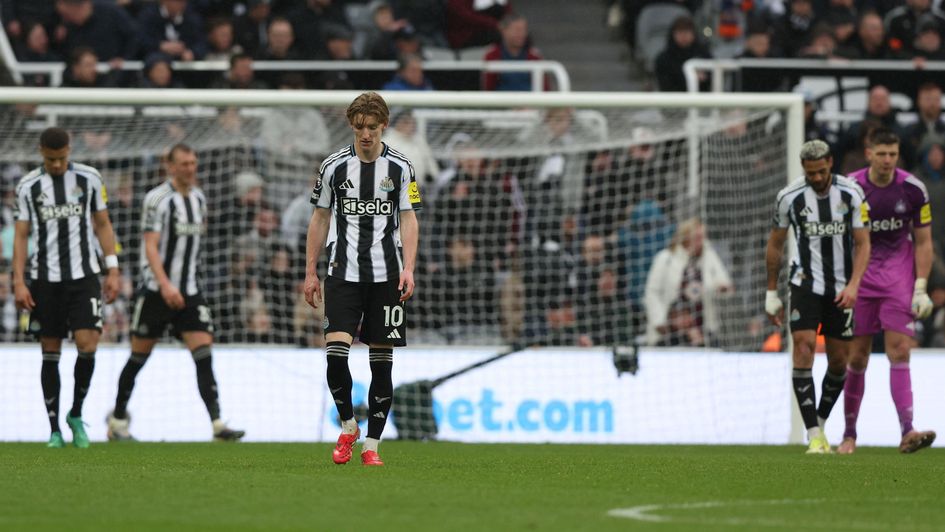Newcastle players react during their defeat to Everton