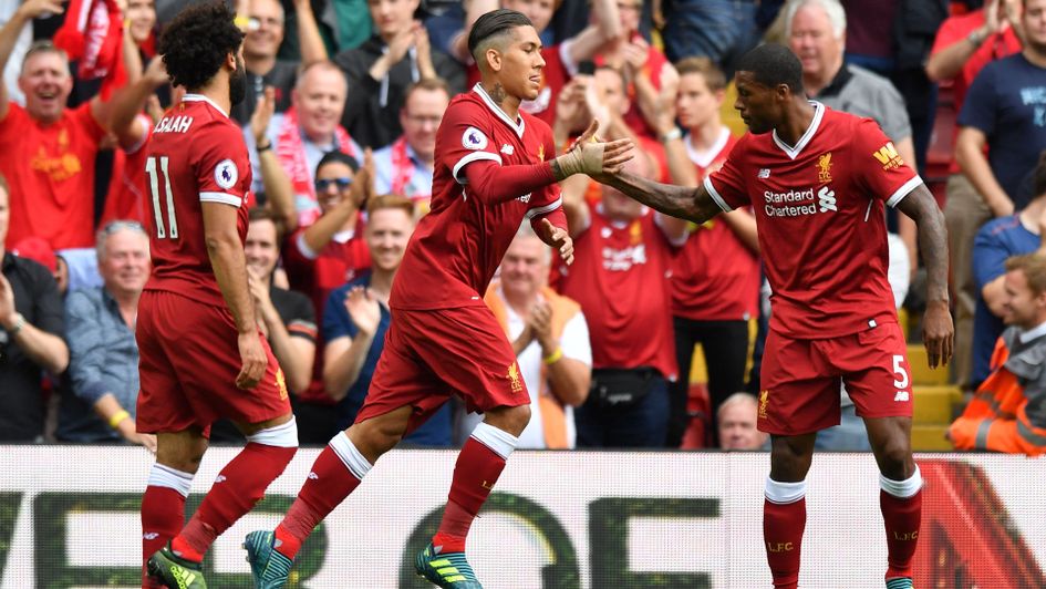 Roberto Firmino celebrates