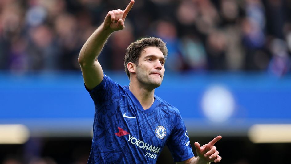 Marcos Alonso celebrates his goal against Tottenham