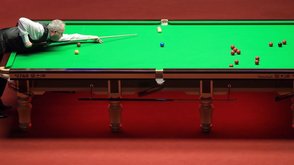 John Higgins in action against David Gilbert