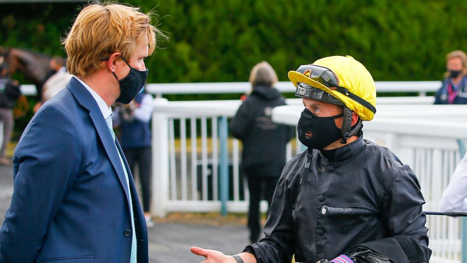 Ed Walker talks to Tom Marquand after the Lingfield win