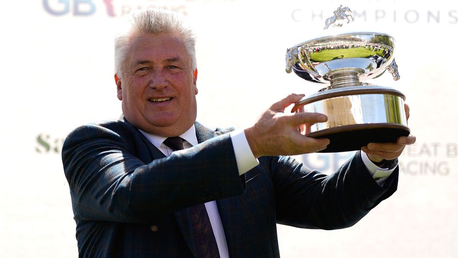Paul Nicholls celebrates winning the trainers' championship