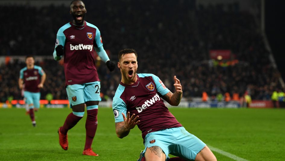 Marco Arnautovic celebrates after scoring against his former club