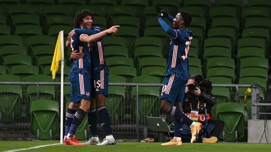 Arsenal duo Mohamed Elneny and Eddie Nketiah celebrate
