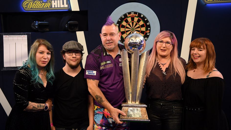 Peter Wright celebrates becoming world champion with his family