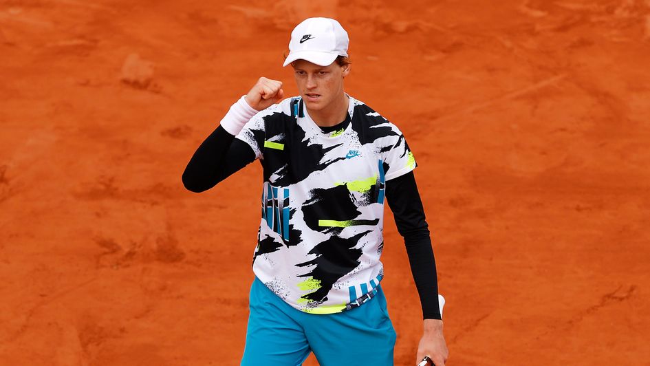 Jannik Sinner celebrates beating Alexander Zverev