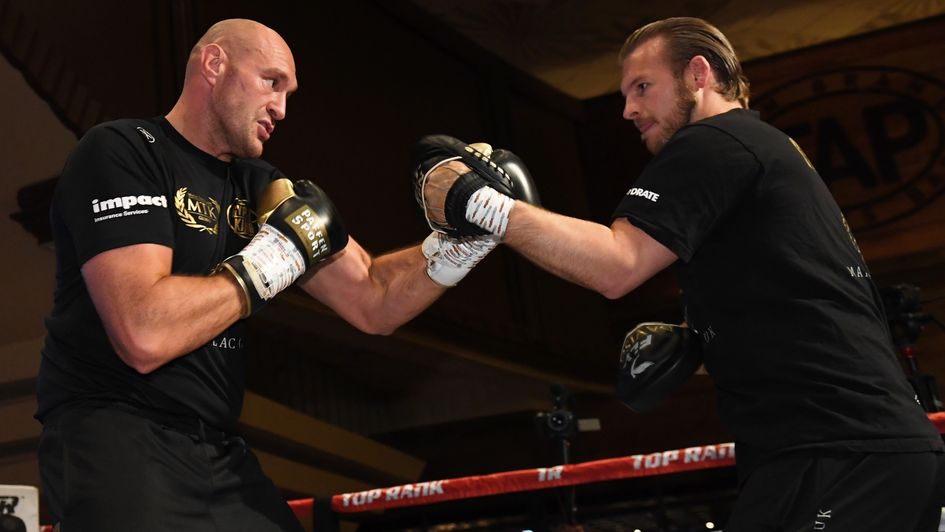 Tyson Fury (left) works out with Ben Davison in Las Vegas ahead of his 2019 fight with Tom Schwarz
