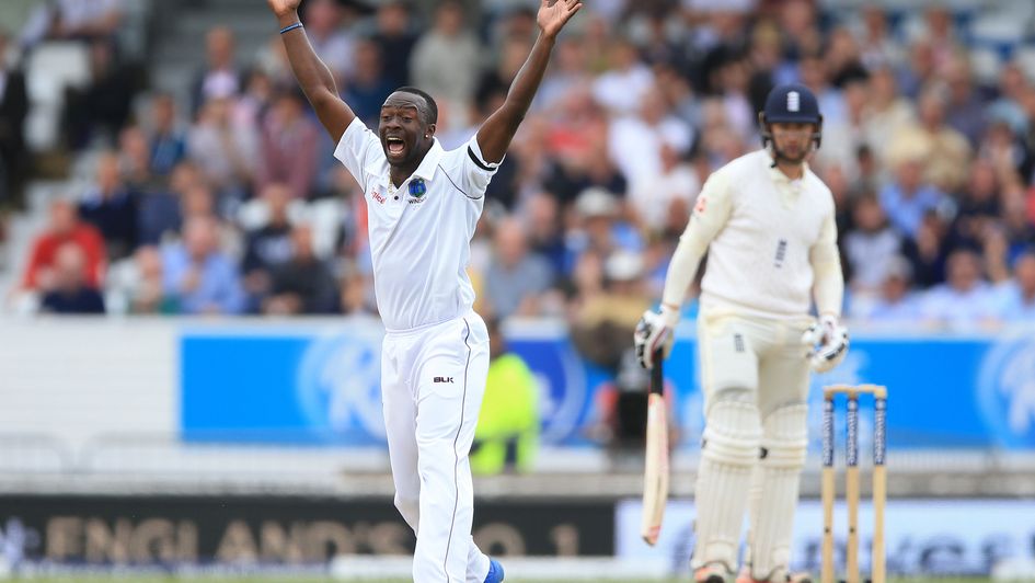 Kemar Roach celebrates